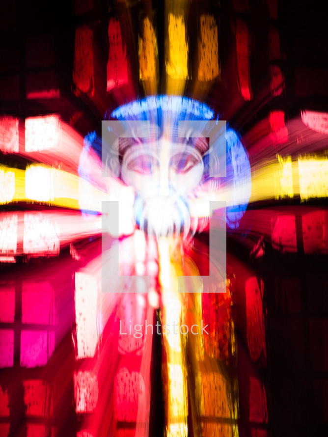 image of Jesus in the reflection of stain glass window 