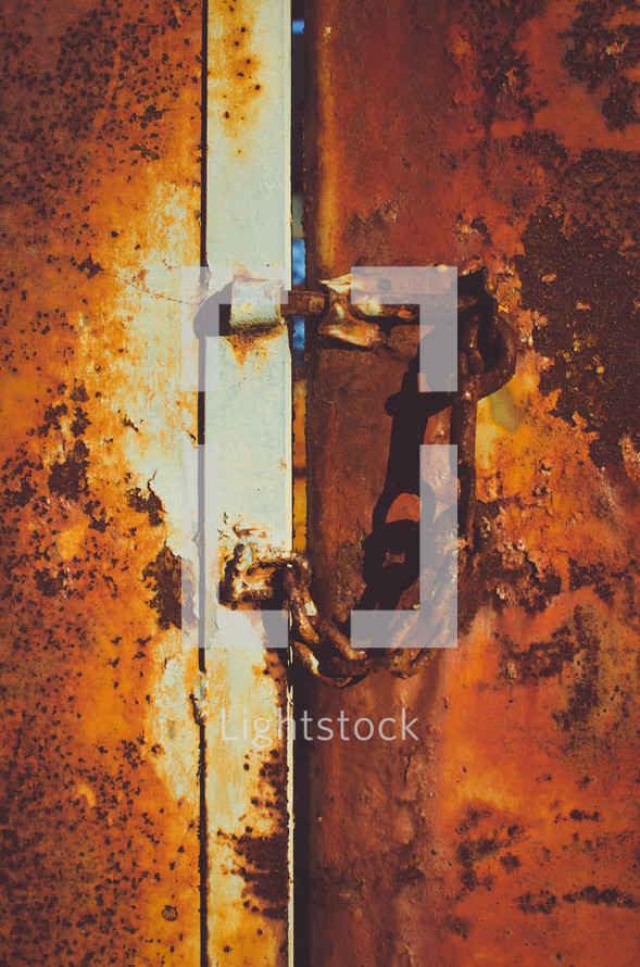 a rusty door and lock 