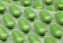 green pills in wrapper 