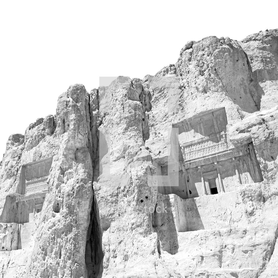 buildings carved into a mountainside in Iran 