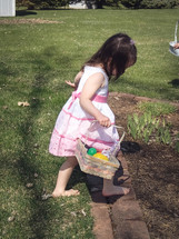 child holding an Easter basket 