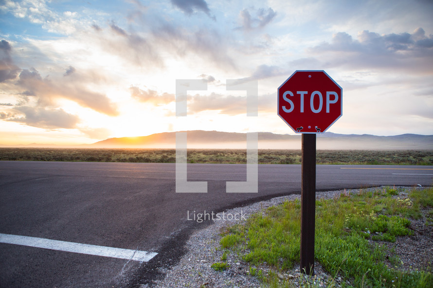 stop sign at sunrise 