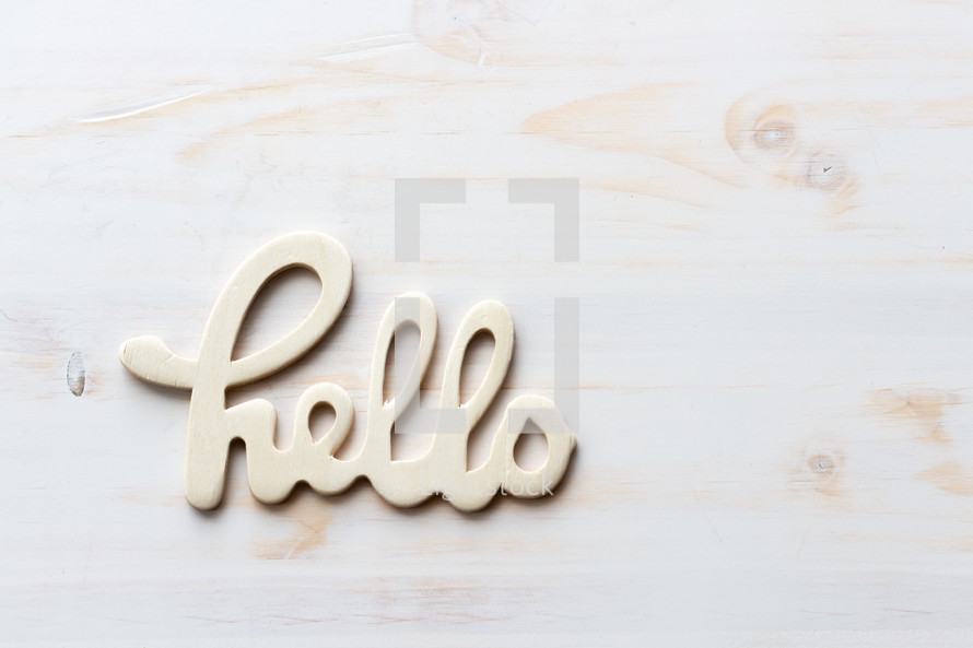 hello sign on white wood 