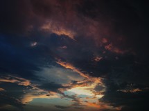 a cloudy sky at sunset 