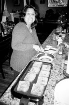a woman making french toast 