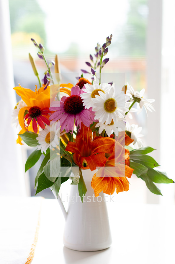 vase of cut summer flowers 