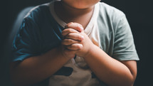 Small child praying
