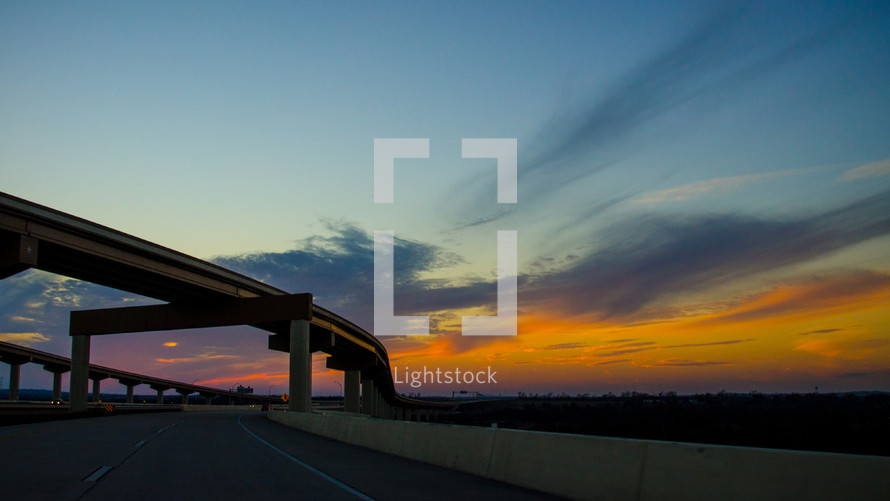 highway overpass at sunset
