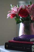 flowers in a vase and notebook and Bible 
