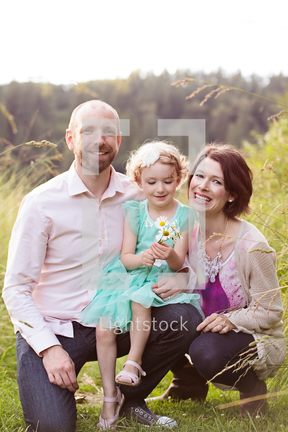 portrait of a family outdoors 