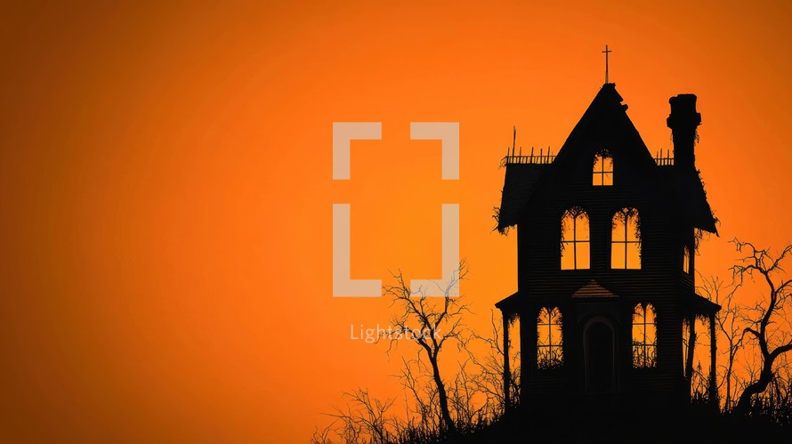 Spooky Haunted House Silhouette against an Orange Sunset, Halloween Concept