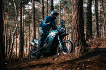 Yamaha Tenere 700 enduro motorbike, adventure motorcycle, off-road rally bike on a woodland trail