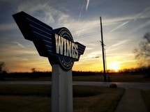 wings corporate estates sign 