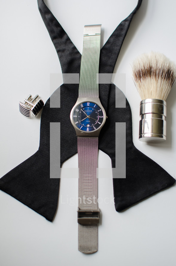 bowtie, watch, brush, and cuff links 