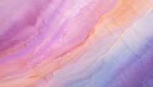 abstract background from multi-colored layers of marble in the form of waves