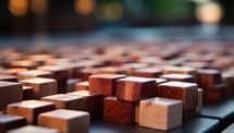 Wooden blocks on the table in the park. Selective focus.