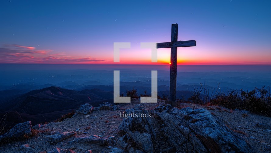 cross on the top of the mountain at sunrise with a beautiful sky