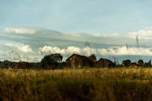 barns in a field in Kenya 