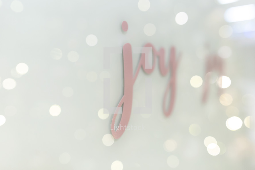 sparkly bokeh and decal of the word joy