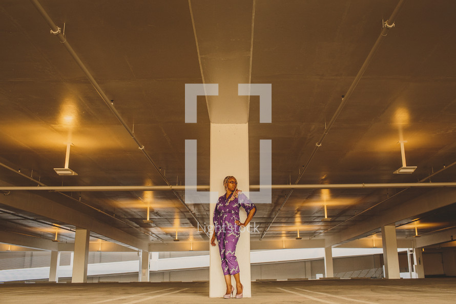 African-American woman posing in a parking garage 