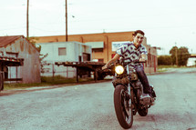 a man riding a motorcycle 
