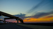highway overpass at sunset