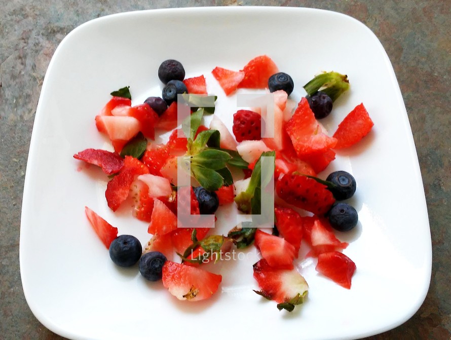 A colorful and nutritious display of strawberries and blue berries on a white square platter plate. One of the biggest problems our country faces is a lack of good nutrition and healthy eating.  The bible gives instructions on healthy eating and diet and yet one of the biggest problems Americans face is a very poor diet that is high in sugar, fat and low in vitamins and minerals. IF we treated Food like Medicine, we would all be healthier and in better physical condition, feel better, and live better so that we can focus on serving the Lord and leading more productive and healthy lives.  