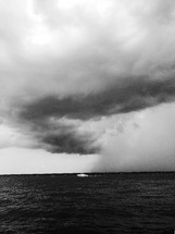 boat on the water in a storm 