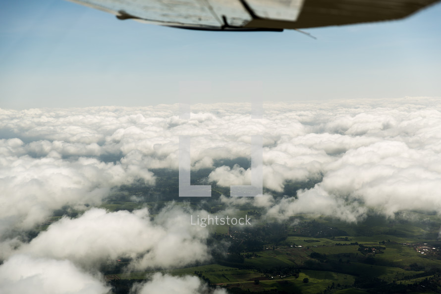 flying over green landscape in Kenya 