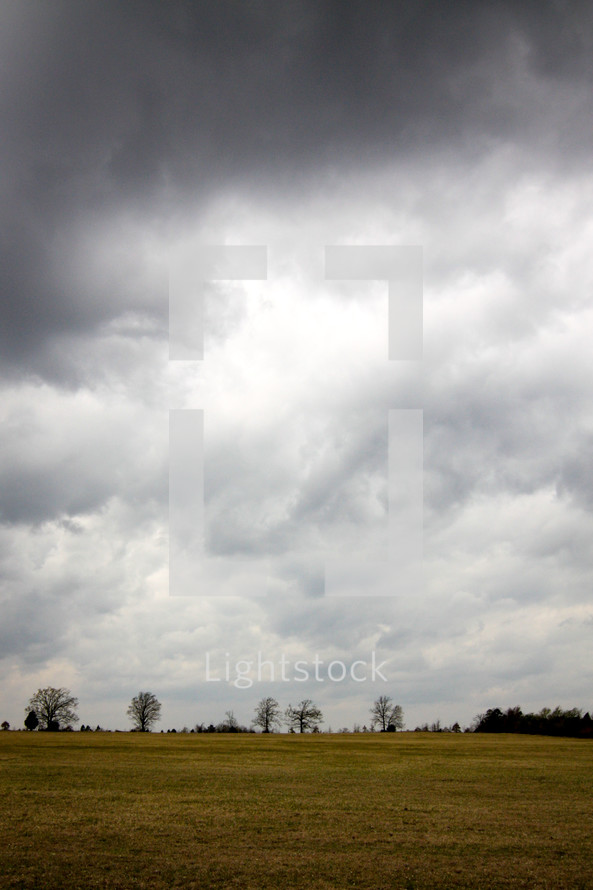 cloudy sky over a field