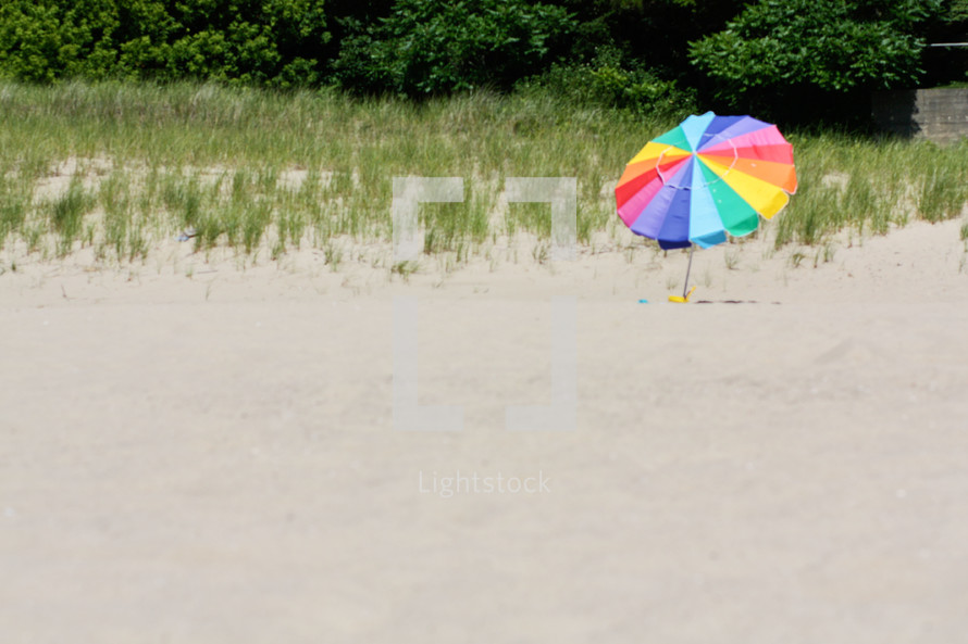beach umbrella in the sand 