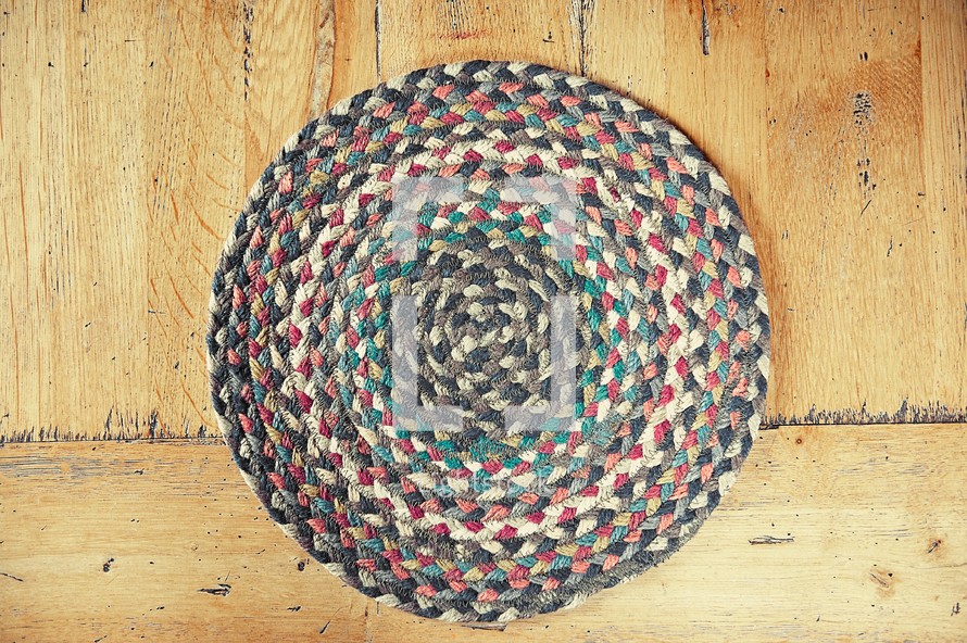 multicolored circular rug 