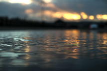 ripples in a water at sunset 