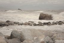 waves crashing against rocks 