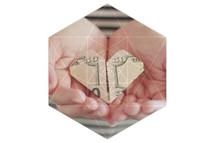 money folded into the shape of a heart 