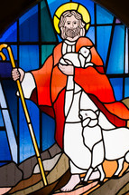 stained glass window of Jesus as a shepherd 