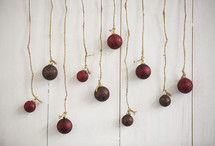 Christmas ornaments hanging from twine 