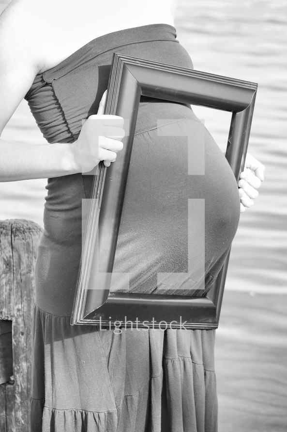 pregnant belly in a frame 