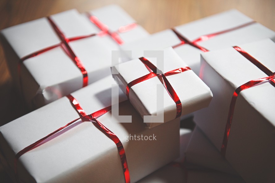 pile of wrapped Christmas gifts 
