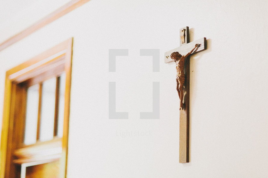 A crucifix hanging on a wall. 