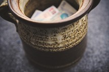 jar of European currency, cash 