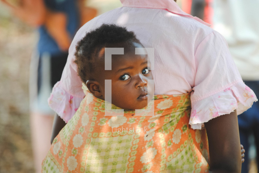 infant in a papoose in Rwanda 
