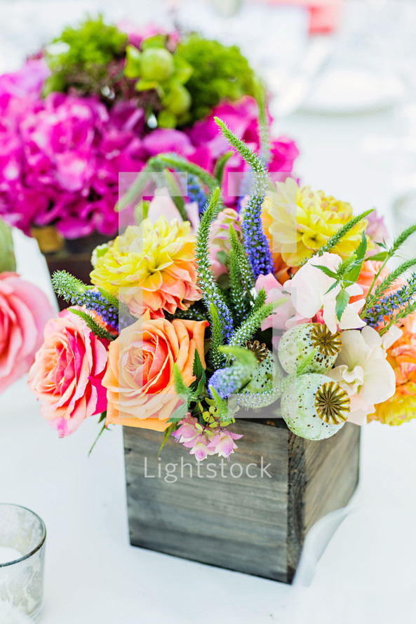 Flower arrangements as centerpieces colorful wood box