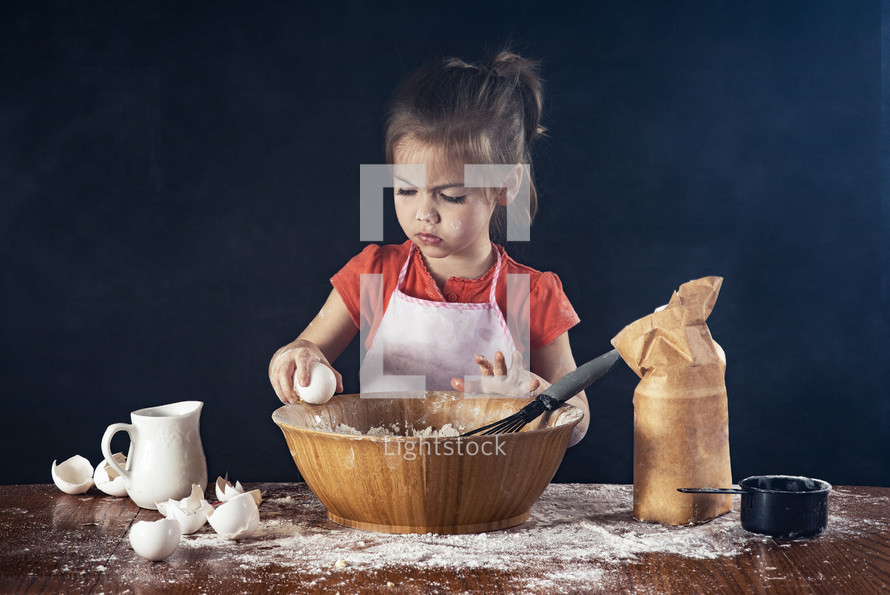 girl baking in a kitchen 