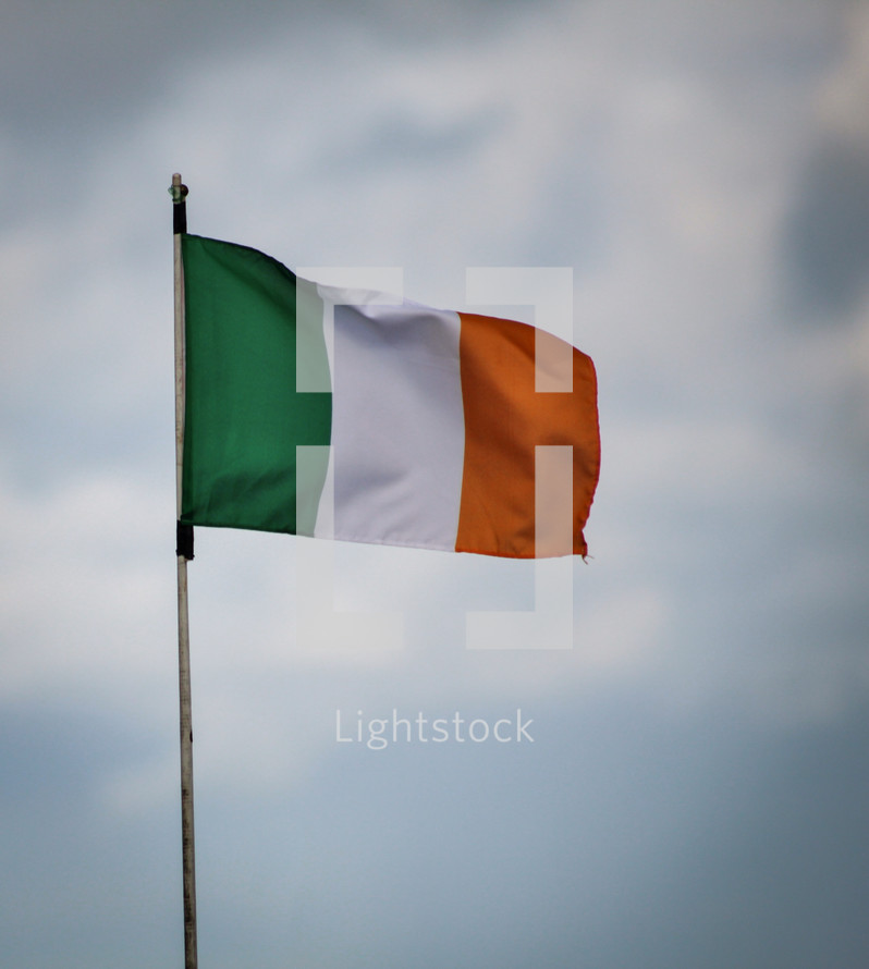 Irish Flag on Sky Background