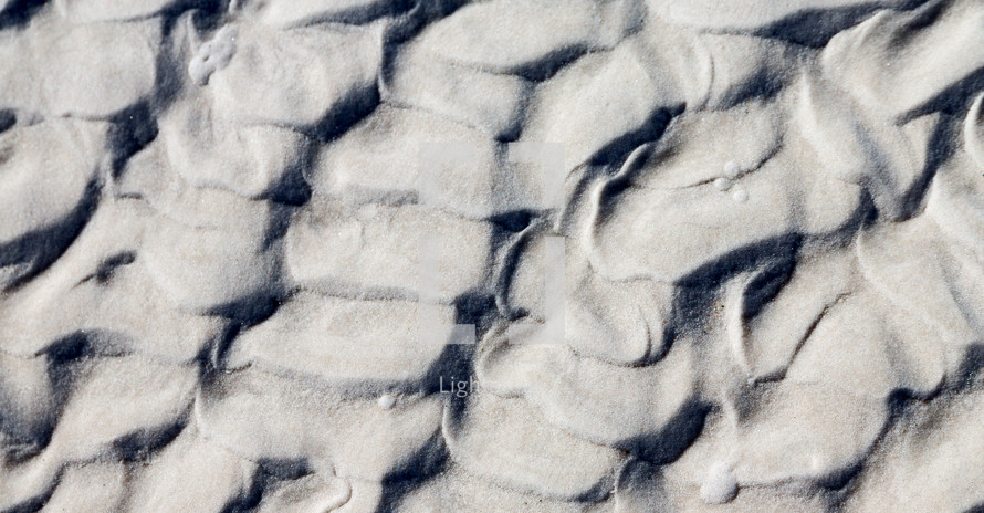 ripples in beach sand 