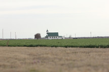 a church and farmland 