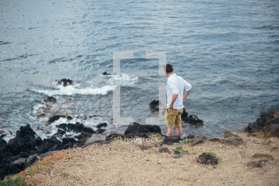 man standing by the sea 