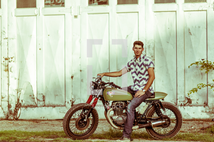 portrait of a man on a motorcycle 