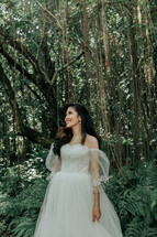 a bride standing in the jungles 